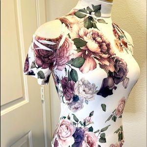 Cold shoulder floral top.
